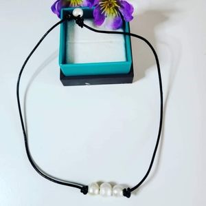 Pearl necklace on pu (vegan) leather cord